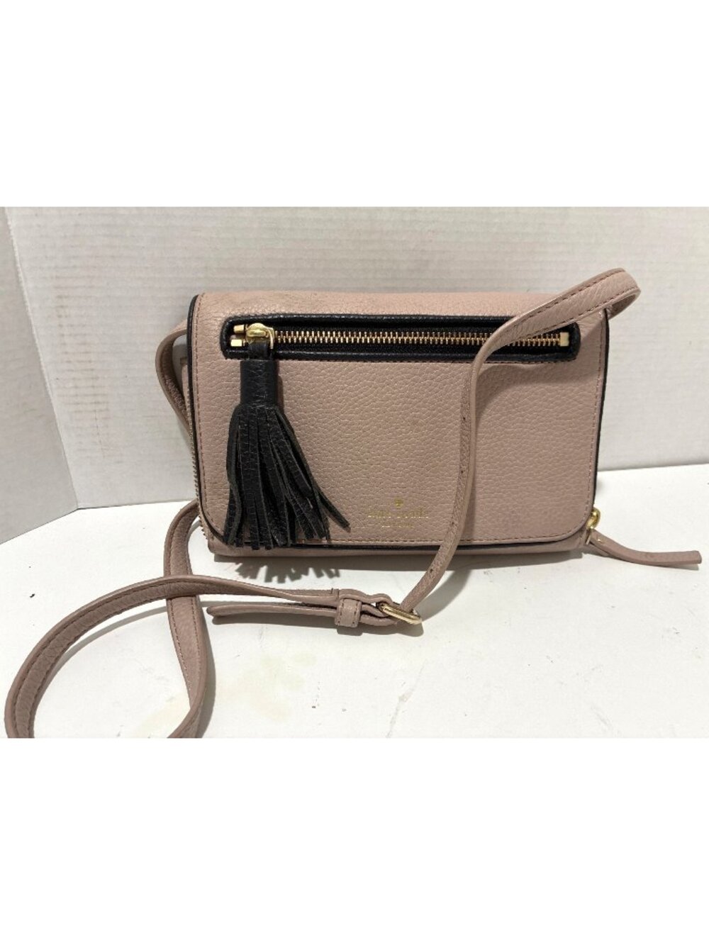 Kate Spade New York Chester Street Avie leather crossbody bag soft almond Tassel